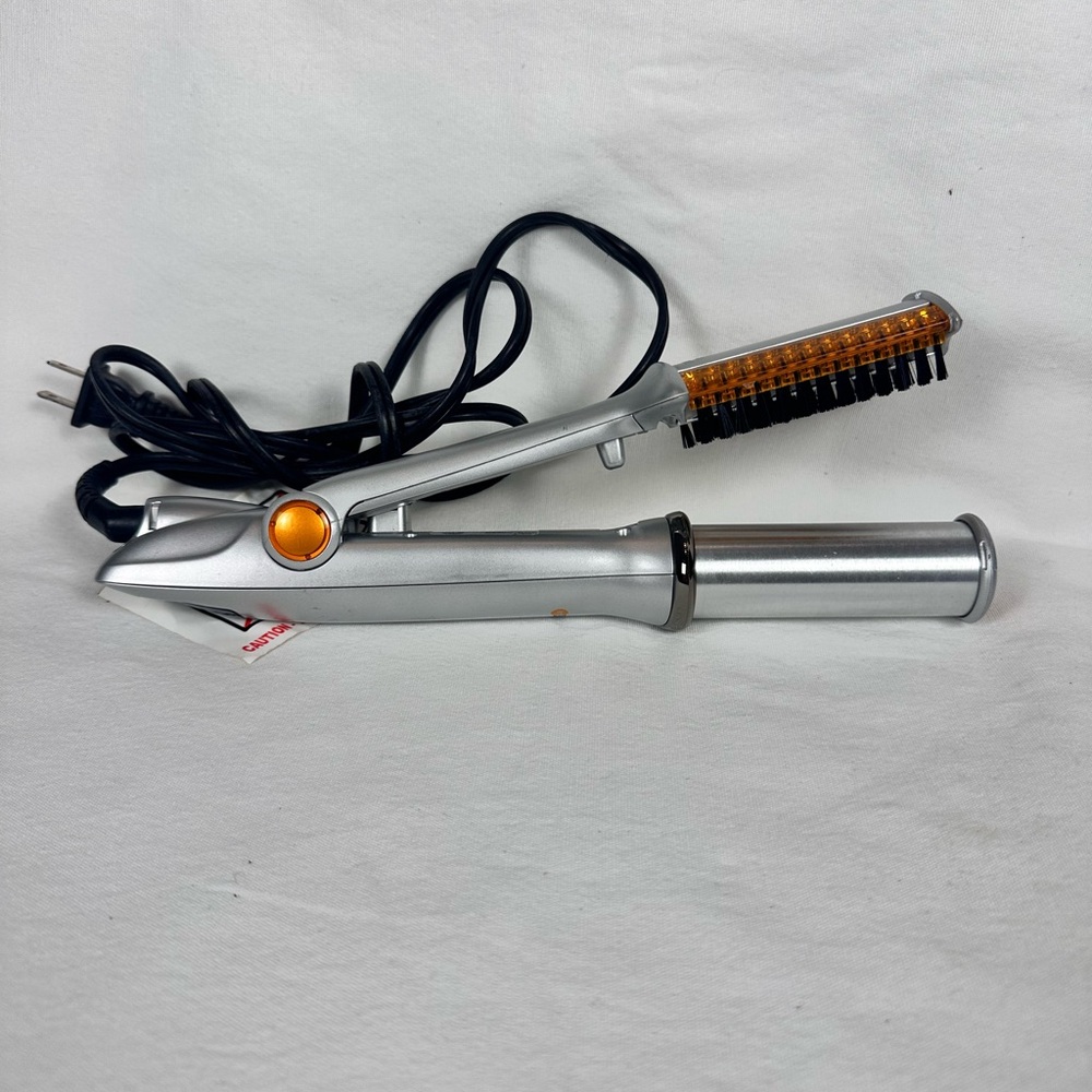 Silver and Orange Hair Styling Device
